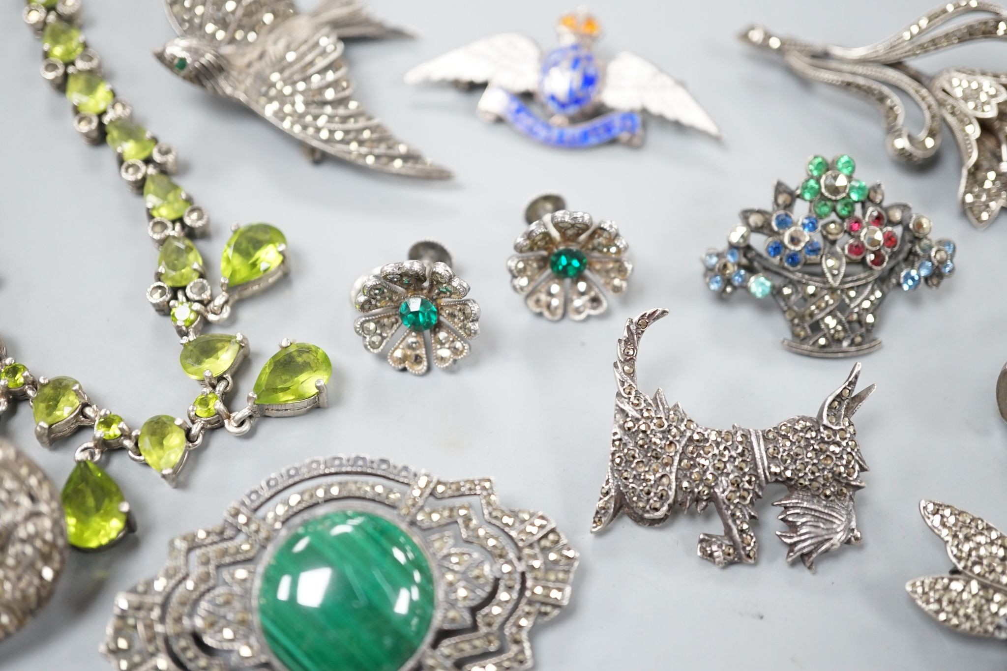 A small collection of assorted mainly white metal and marcasite set jewellery, including brooches, bracelet etc. and an enamelled RAF brooch.